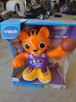 V-tech dribble and bounce tiger