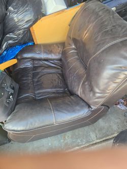 brown leather recliner normal wear good condition.