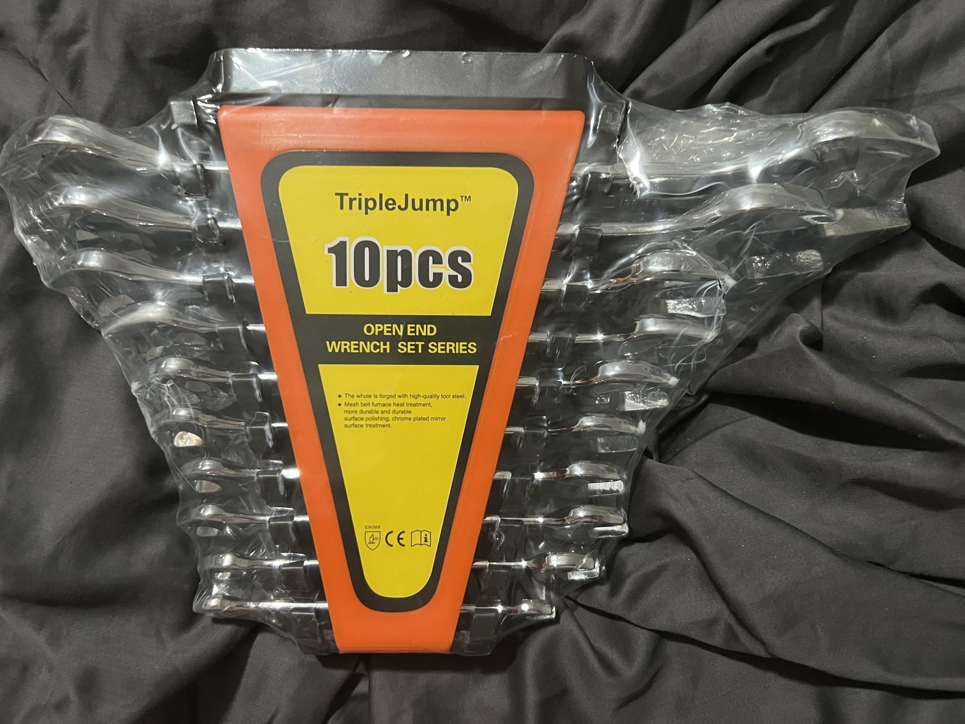 BRAND NEW IN HOLDER TripleJump 10 piece metric open end wrench set with holder New in the factory wrapping - TripleJump 10 piece metric open end wrenc