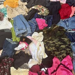More than 200 women’s clothing. Size S/M/L, $1 each.