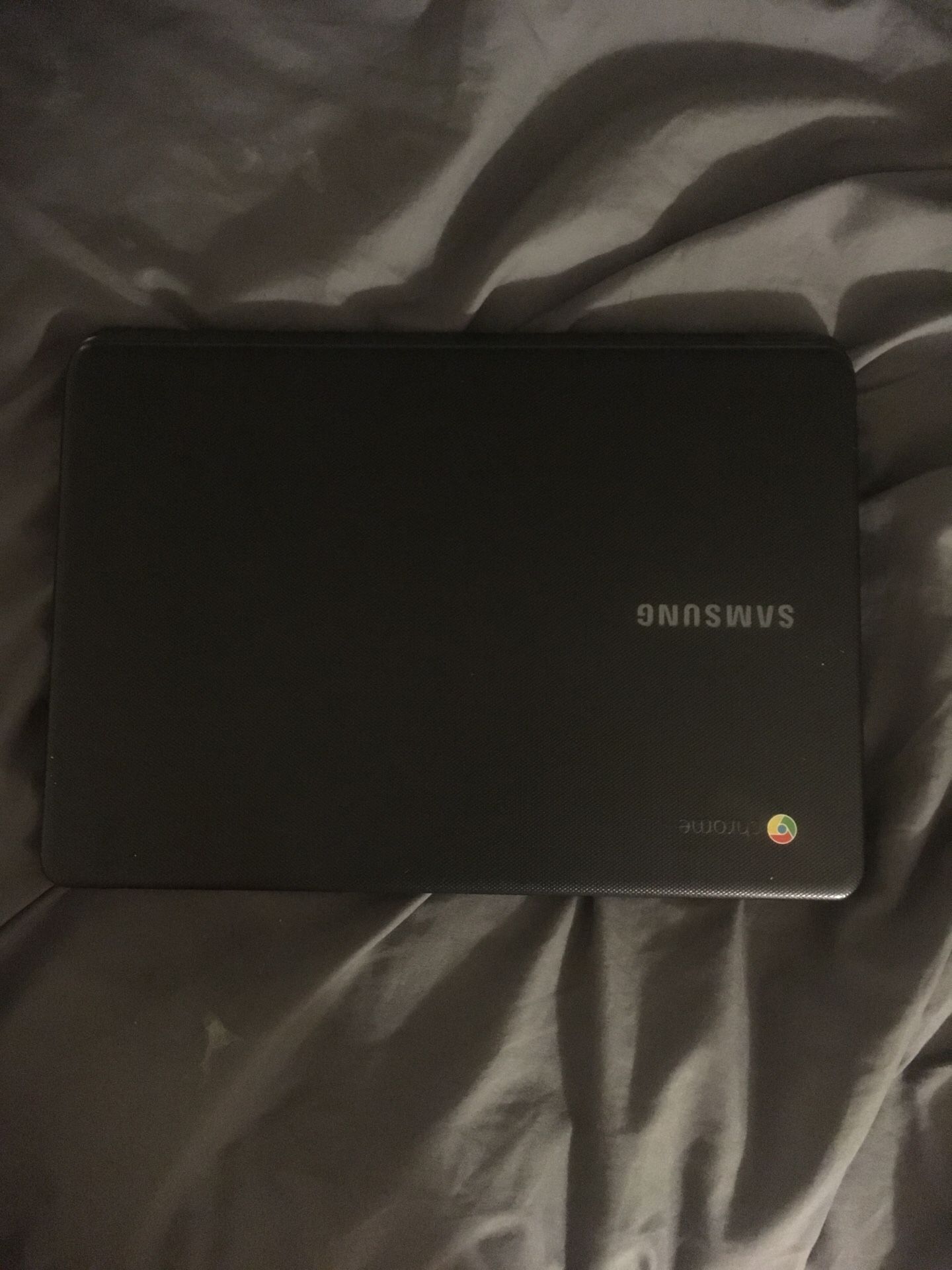 chromebook 2 years old some scratches no charger but works