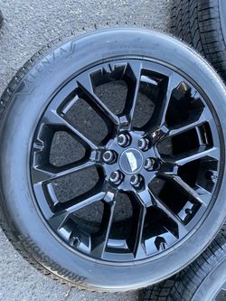 22” Escalade stock rims and tires for sale oem