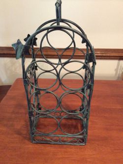 Wine bottle holder wrought iron distress green holds 7 bottles 18”tall ,9”wide ,6” deep