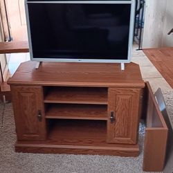 LG Smart TV and Entertainment Stand