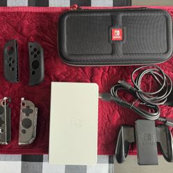 Nintendo Switch OLED (Barely Used) 