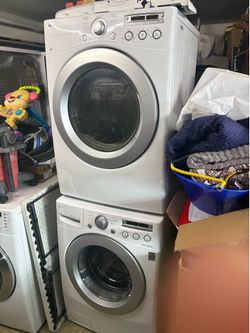 Lg Stackable  Washer and gas dryer  Excellent working condition  Heavy duty  W27 D30 H78 Washer 4.0 cu ft Dryer 7.3 cu ft 3 months warranty parts and 