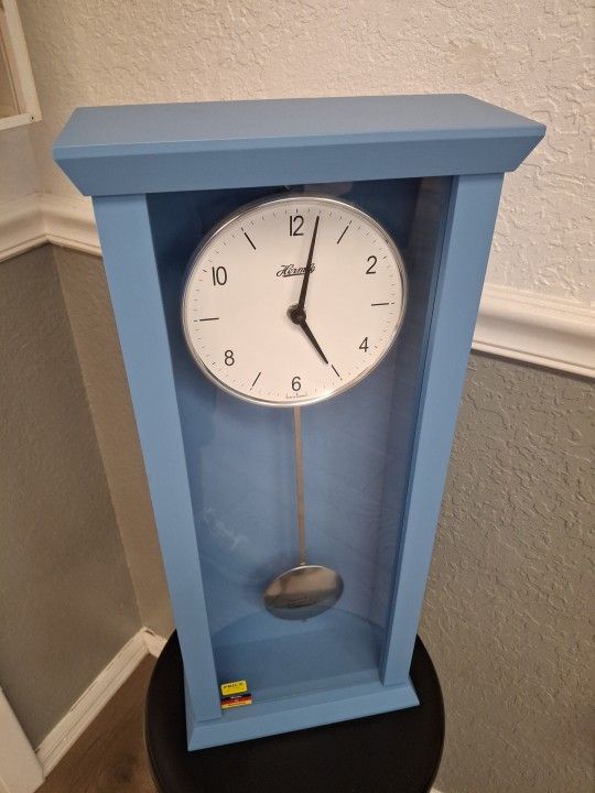 Blue Color Wall Clock And Pendulum 