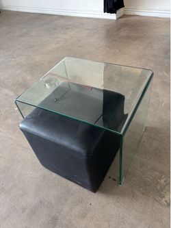 Glass table and blk ottoman