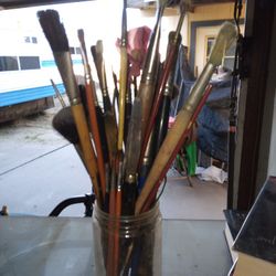 Blank Canvases And Variety Of Brushes 