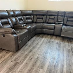 New Reclining Sectional.  Grey Or Brown Gel Leatherette.  106” X 106”.  Free Delivery!