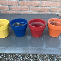 Set Of Four Colored Flower Pots