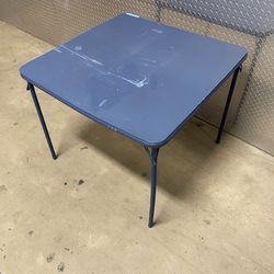 Cosco 34” Square Vinyl Top Folding Table. Blue. Ideal for indoor or outdoor use.