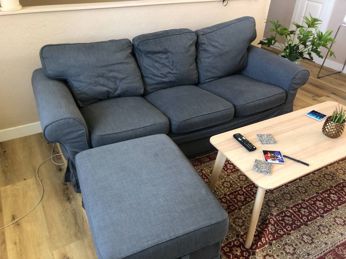 Gray Sectional Or Couch And Ottoman 