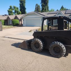 Bobcat Tractor John Deere 317