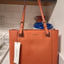 Brand new Calvin Klein Top Zip Saffiano Leather North/South Tote