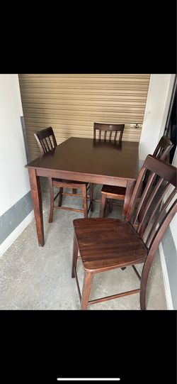 Heavy solid wood table and 4 chairs