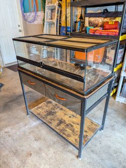 Reptile enclosure and cabinet stand