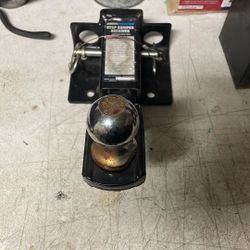 A Complete Tow Hitch With The Attachment To Put On A Truck Or A Car