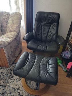 Leather chair with foot rest