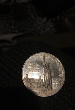 1986 Ellis island silver dollar