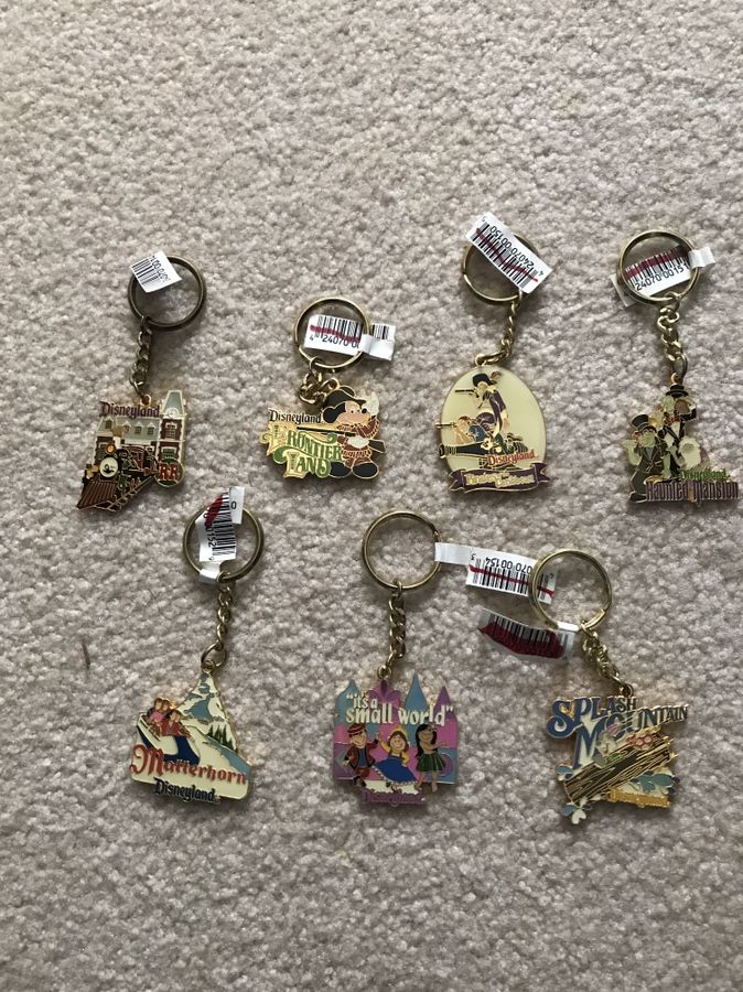 Disney theme park ride attraction keychains. Please read