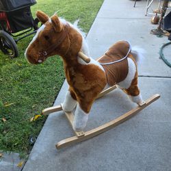 Child rocking horse toy