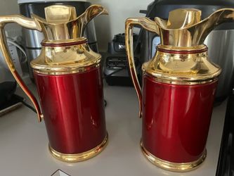 Pair of red and gold thermal coffee carafes
