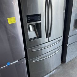 Samsung four-door refrigerator with 90 day warranty