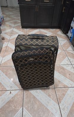 American flyer check in suitcase spinner