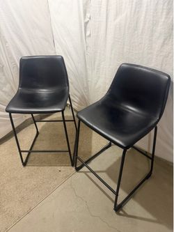 2 black leather bar stool chairs