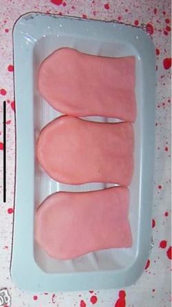 Severed tongues on tray Halloween prop decoration