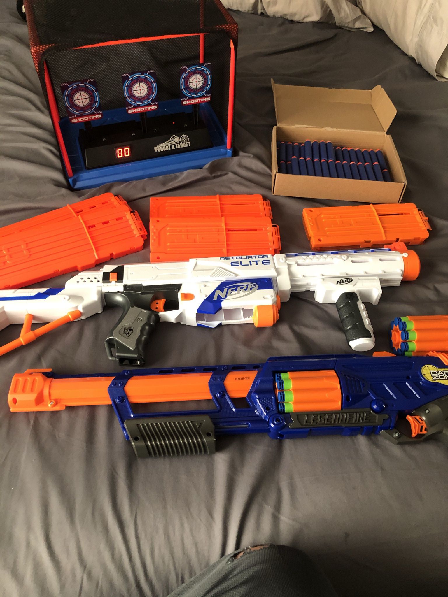 Two Dart Guns With Extended Mags, Extra Darts, And Firing Range
