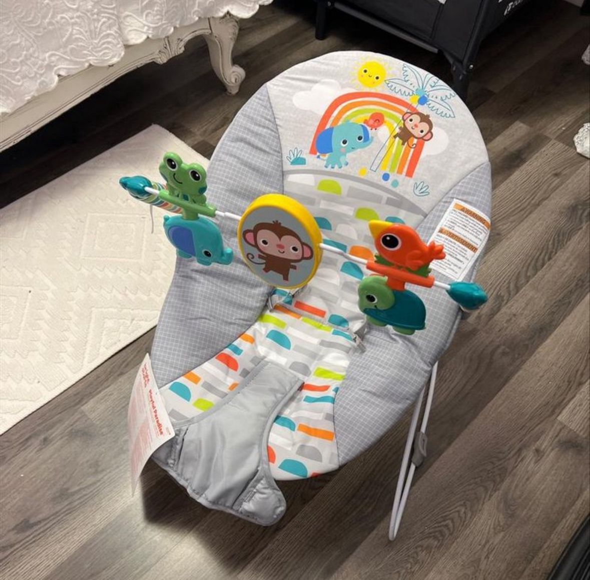 Bright Starts Playful Paradise Vibrating Baby Bouncer with Toys