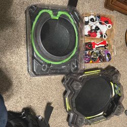 A Few Beyblades And 2 Stadiums