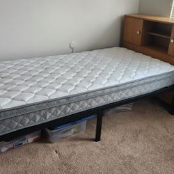 Twin size bed,   frame, matress, dresser.