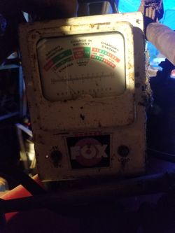 Antique battery tester with Advertisement