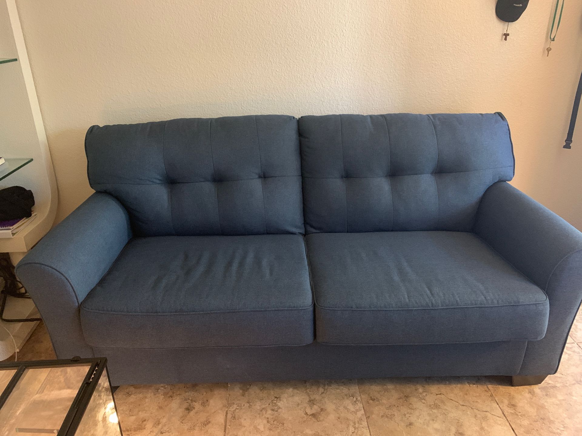 Blue sofa with pillows