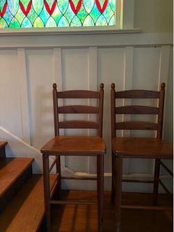 2 Wood bar stools. Some scratches.35.00 each.