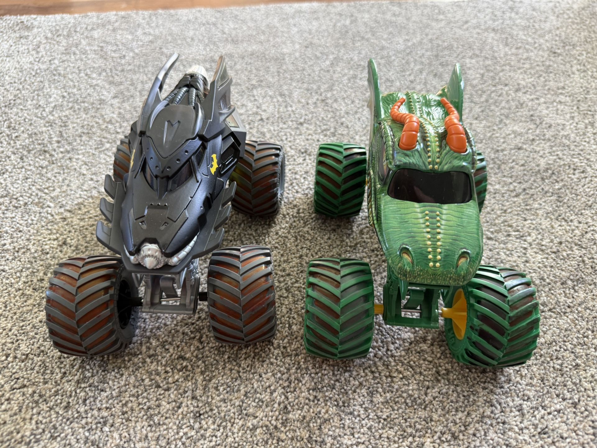 Two 1:24 Scale Monster Jam Trucks