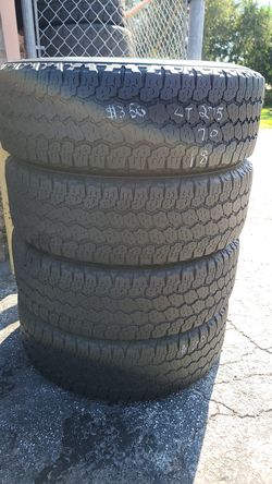 4 used LT275/70/18 OR 33 INCH Goodyear wrangler AT