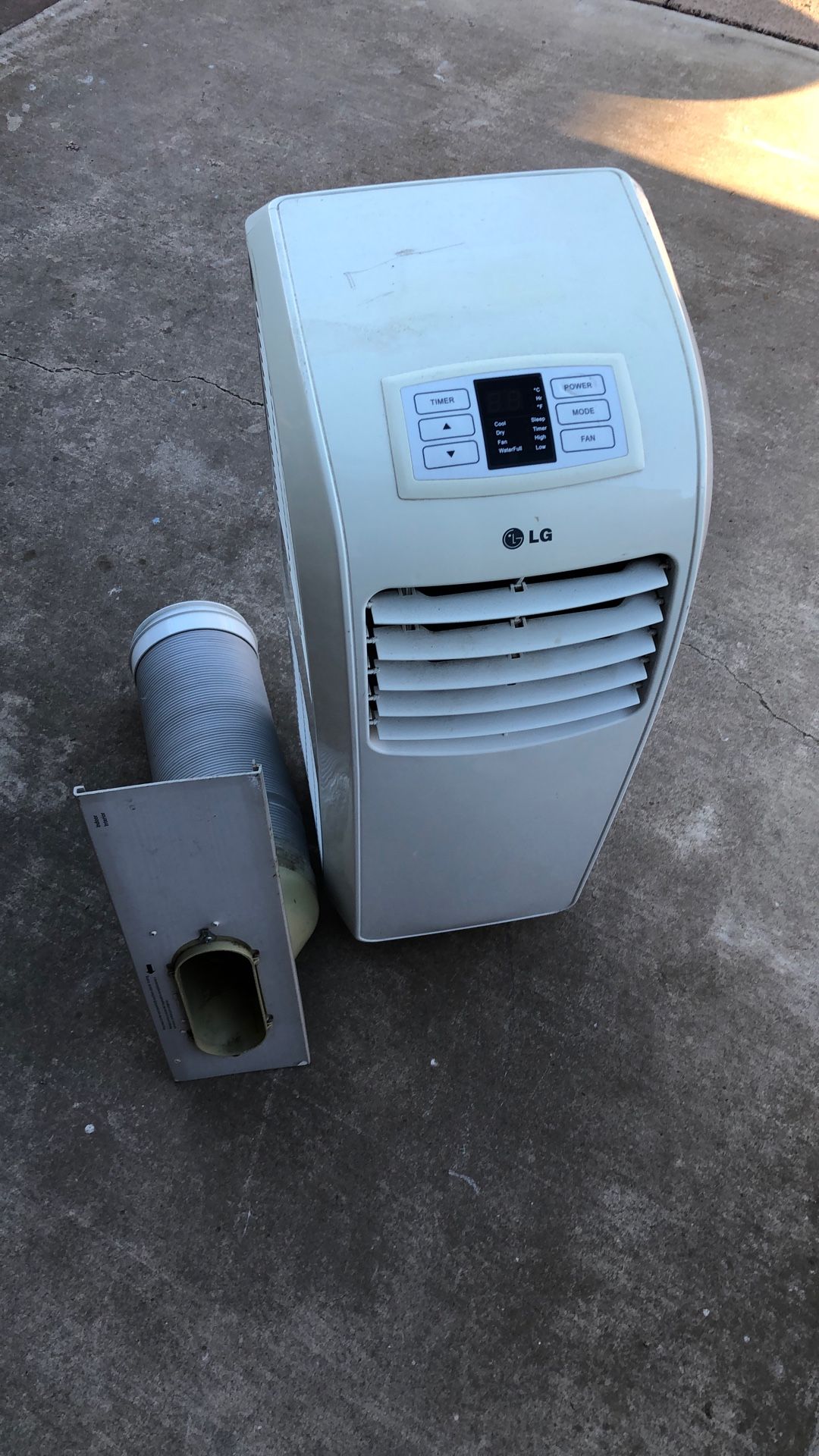 LG Portable AC 8,000 BTU With The Hose And Attached Windows