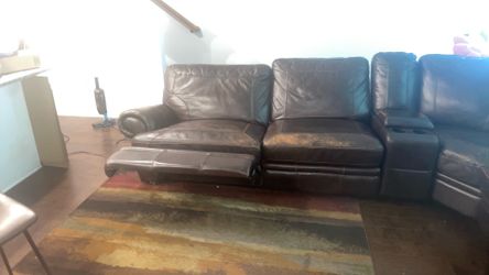 leather reclining sectional sofa (with built-in recliners and a console/cup holders