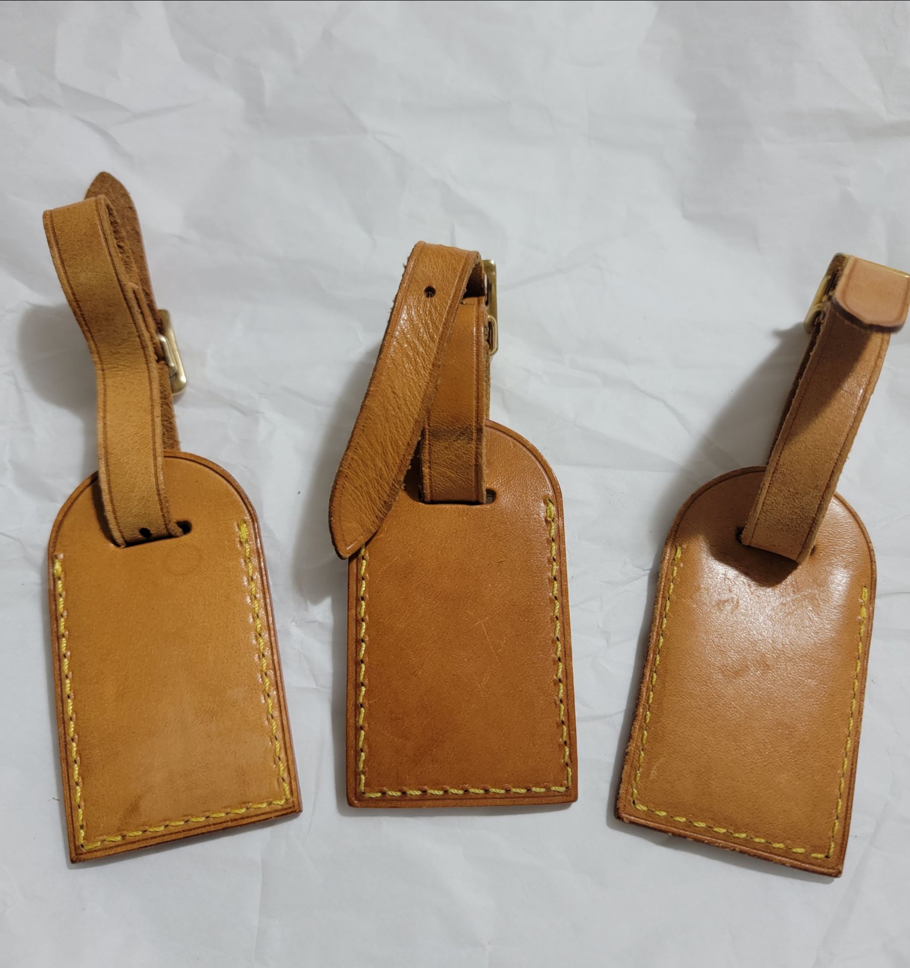 Louis Vuitton leather bag tags