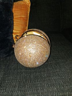 Gold diamond round purse never used