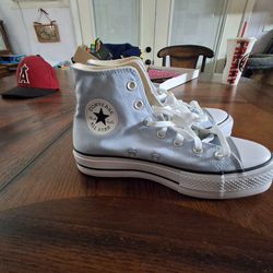Converse Chuck Taylor All Star Lift High Top Canvas sneakers in a light blue color.