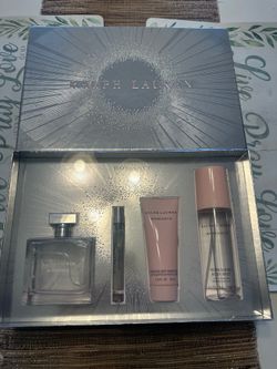 Ralph Lauren Romance fragrance set. This silver gift box includes a 3.4 fl oz Eau de Parfum spray, a 0.34 fl oz travel spray, a 2.5 fl oz sensuous bod