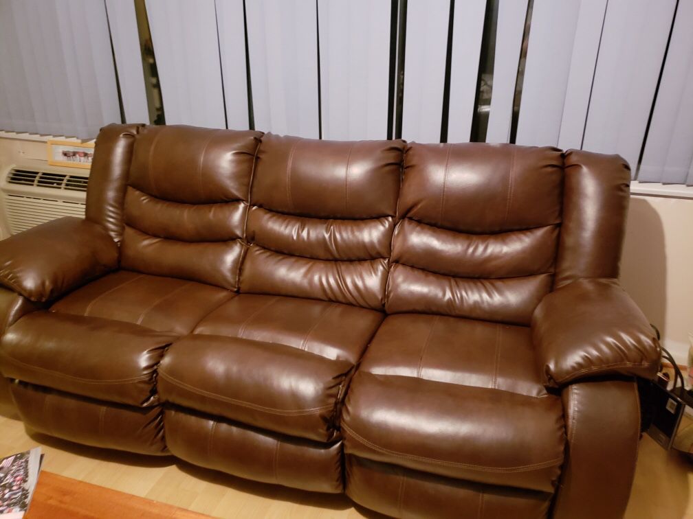 Brown leather couch and recliner