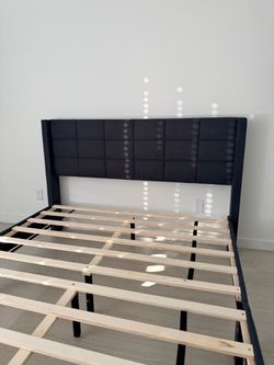 Bed frame new in box queen size