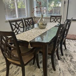 Beautiful Cherry Wood Table With Glass Top And Six Chairs With Mocha Seats