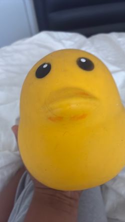 Yellow shaving cream squishy duck